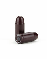 Close-up of hard anodized aluminum snap caps for training